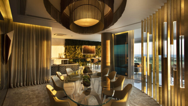 Riserva Golf Vista Mare Residenziale by pininfarina Sala de jantar entardecer